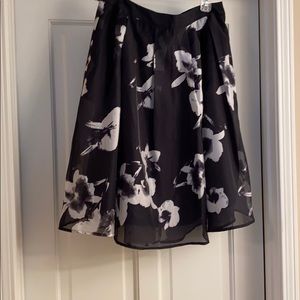 Beautiful black skirt with soft floral print